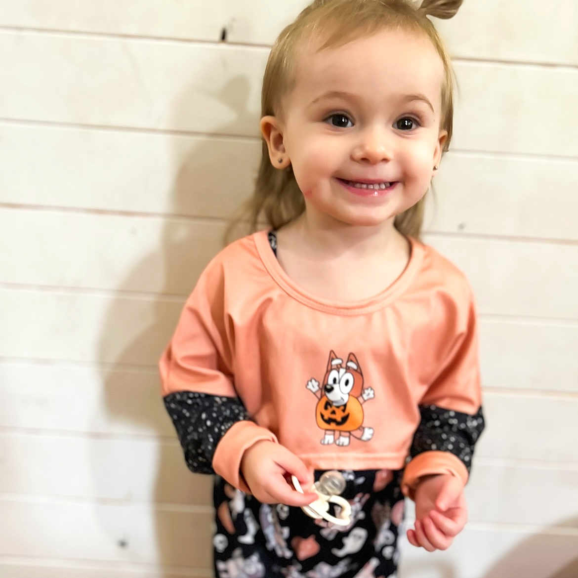Jailah joined the competition — help win amazing prizes! animal, bodypart, child, clothing, face, female, finger, girl, hand, happy, head, invertebrate, pants, person, photography, portrait, sleeve, smile, spider, t_shirt