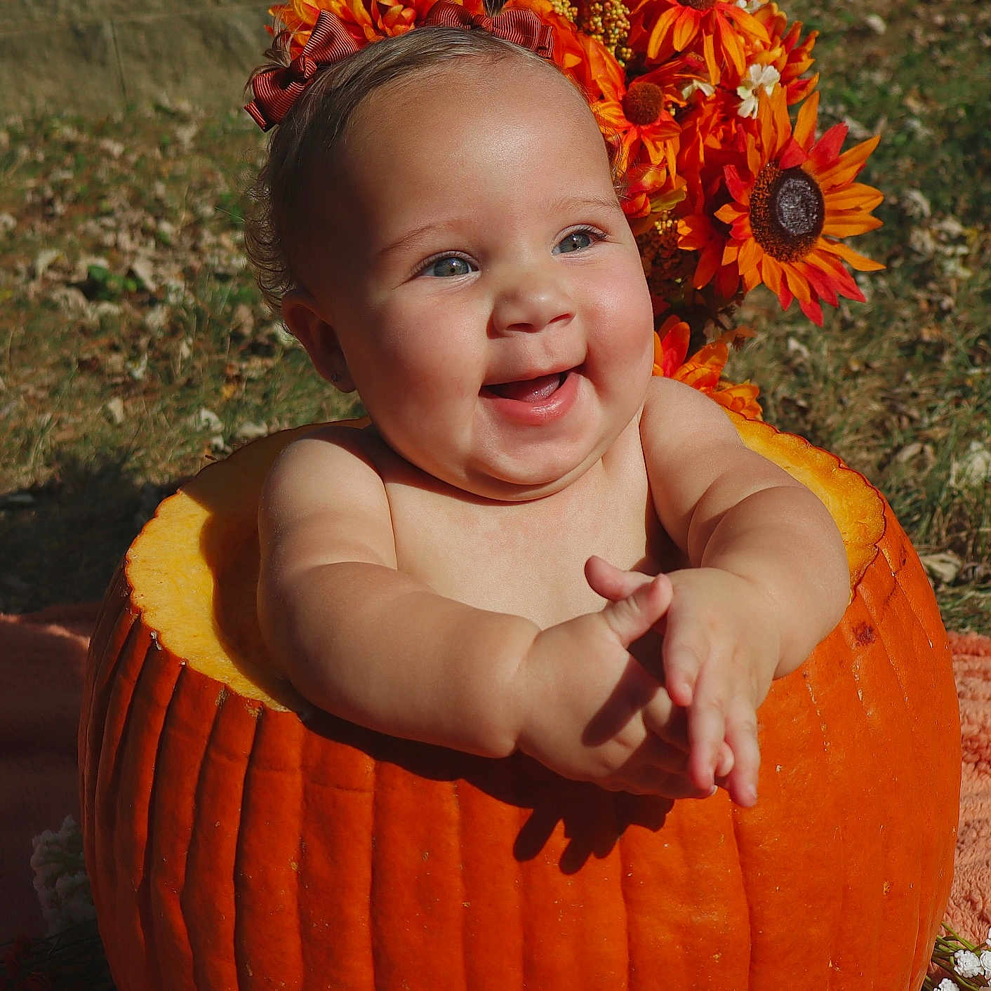 Elora is registered to the contest to win money with this photo: autumn, baby, celebration, child, cute, fall, flower_crown, grass, happy, headband, holiday, nature, orange, outdoor, portrait, pumpkin, seasonal, skin, smiling, sunlight