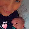 King joined the competition — help win amazing prizes! adult, baby, pacifier, face, smile, closeup, selfie, heart, text_overlay, indoor, person, holding, infant, love, cute, cozy, family, portrait, skin, clothing