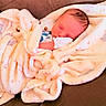King is registered to the contest to win money with this photo: baby, blanket, child, comfort, couch, cozy, cute, fabric, face, indoors, infant, newborn, peaceful, portrait, relaxation, resting, sleeping, soft, warm, wrapped