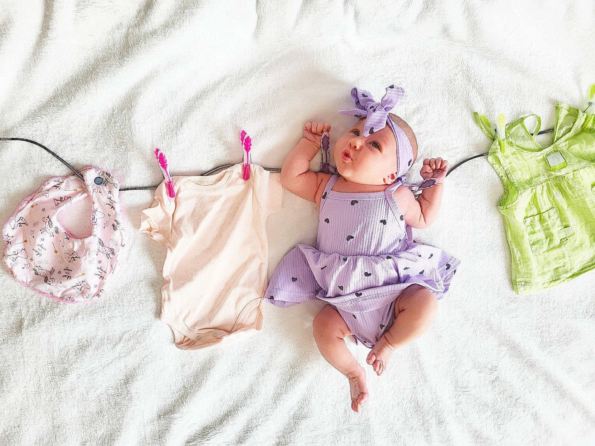 Eloane participe au concours pour gagner de l'argent avec cette photo : baby_toddler_clothing, doll, dress, fashion_accessory, hair_accessory, hand, hat, headband, headpiece, jewellery, linens, magenta, pattern, person, pink, purple, textile, thigh, toy, undergarment