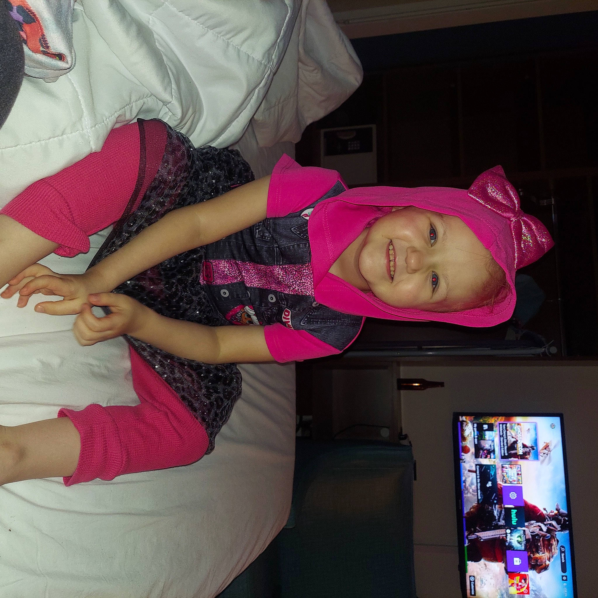 Alison is registered to the contest to win money with this photo: baby_products, baby_toddler_clothing, chest, child, comfort, elbow, fun, human_leg, joy, knee, magenta, nail, person, pink, room, shorts, smile, t_shirt, textile, thigh