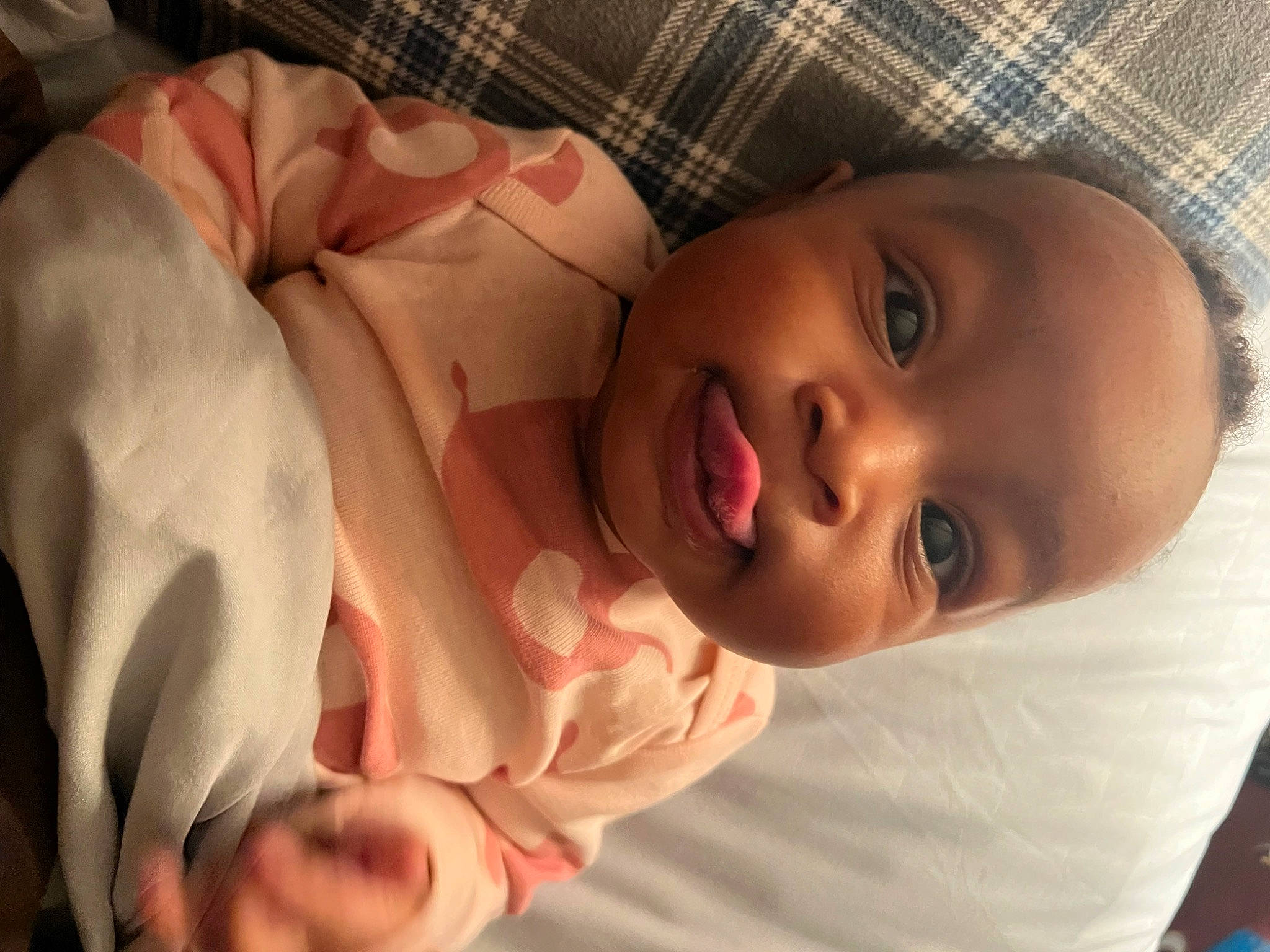 Kenna is registered to the contest to win money with this photo: baby, baby_toddler_clothing, cheek, child, chin, comfort, eye, eyebrow, eyelash, gesture, hat, head, human_body, iris, lip, mouth, nose, person, skin, smile