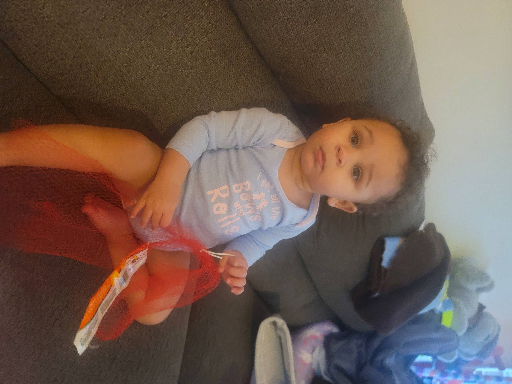 Avery joined the competition — help win amazing prizes! baby, baby_products, baby_toddler_clothing, child, comfort, eye, fun, human_leg, knee, lap, linens, mouth, nail, person, room, sitting, t_shirt, textile, thigh, thumb