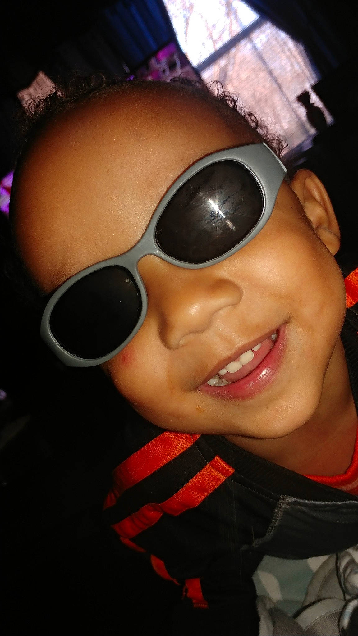 Royal is registered to the contest to win money with this photo: black_hair, cheek, chin, cool, eyewear, fun, girl, glasses, joy, lip, mouth, person, product, smile, sunglasses, vision_care