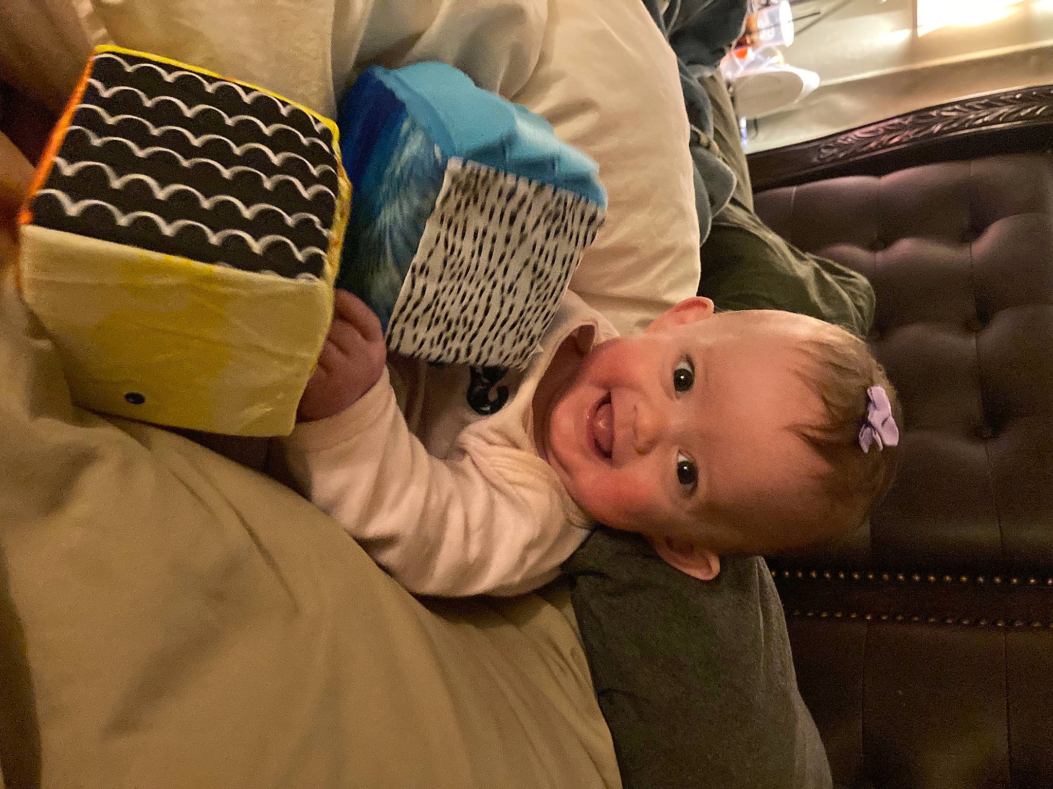 Susie joined the competition — help win amazing prizes! baby, baby_products, baby_sleeping, child, comfort, couch, flooring, fun, happy, joy, laugh, linens, luxury_vehicle, nap, person, reading, room, sitting, sleep, smile