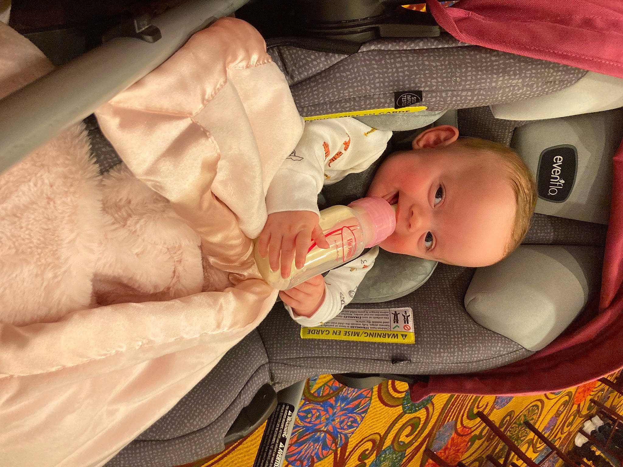 Susie is registered to the contest to win money with this photo: auto_part, baby, baby_carriage, baby_products, baby_safety, baby_toddler_clothing, car_seat, carmine, child, comfort, finger, hand, linens, nail, pattern, person, product, skin, thumb, toddler