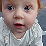 Nova joined the competition — help win amazing prizes! toddler, child, red_hair, blue_eyes, crawling, white_shirt, curious, face, hands, indoor, carpet, close_up, portrait, baby, young_child, cute, expression, skin, person, infant