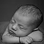 arms, baby, black_and_white, calm, child, close_up, cute, face, hair, hands, infant, lying_down, newborn, peaceful, portrait, resting, skin, sleeping, soft, texture