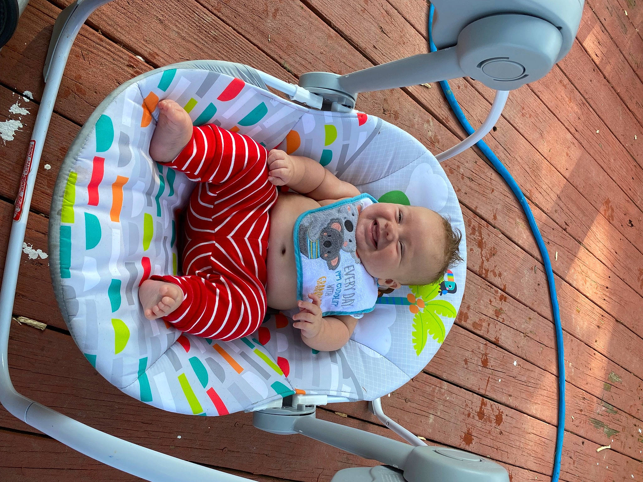 Kol is registered to the contest to win money with this photo: baby, baby_products, baby_toddler_clothing, baby_toys, child, circle, flooring, fun, hardwood, hat, joy, leisure, mechanical_fan, pattern, person, play, recreation, t_shirt, toddler, toy