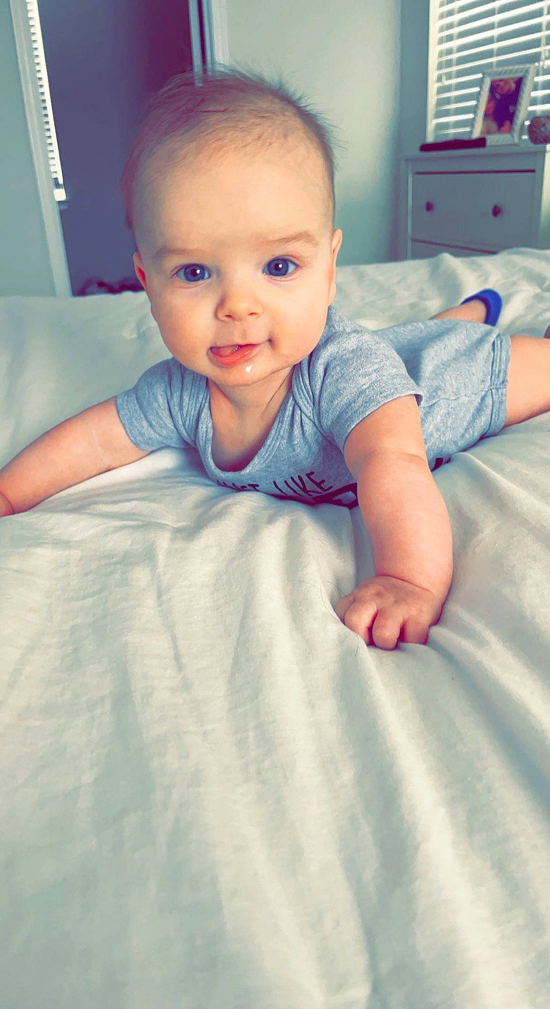 Brock is registered to the contest to win money with this photo: arm, baby_toddler_clothing, cheek, chin, comfort, eye, eyebrow, face, hair, hairstyle, hand, head, human_body, joint, leg, mouth, nose, person, shoulder, skin