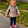 backpack, casual_clothing, child, curly_hair, cute, daylight, fashion, grass, hair_clip, happy, jacket, nature, outdoor, pink_sneakers, plants, portrait, sidewalk, toddler, walking, young_child