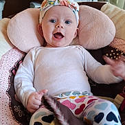 Bella is registered to the contest to win money with this photo: architecture, baby, bodypart, building, clothing, couch, crib, cushion, face, finger, furniture, hand, hat, head, homedecor, infantbed, newborn, person, photography, portrait