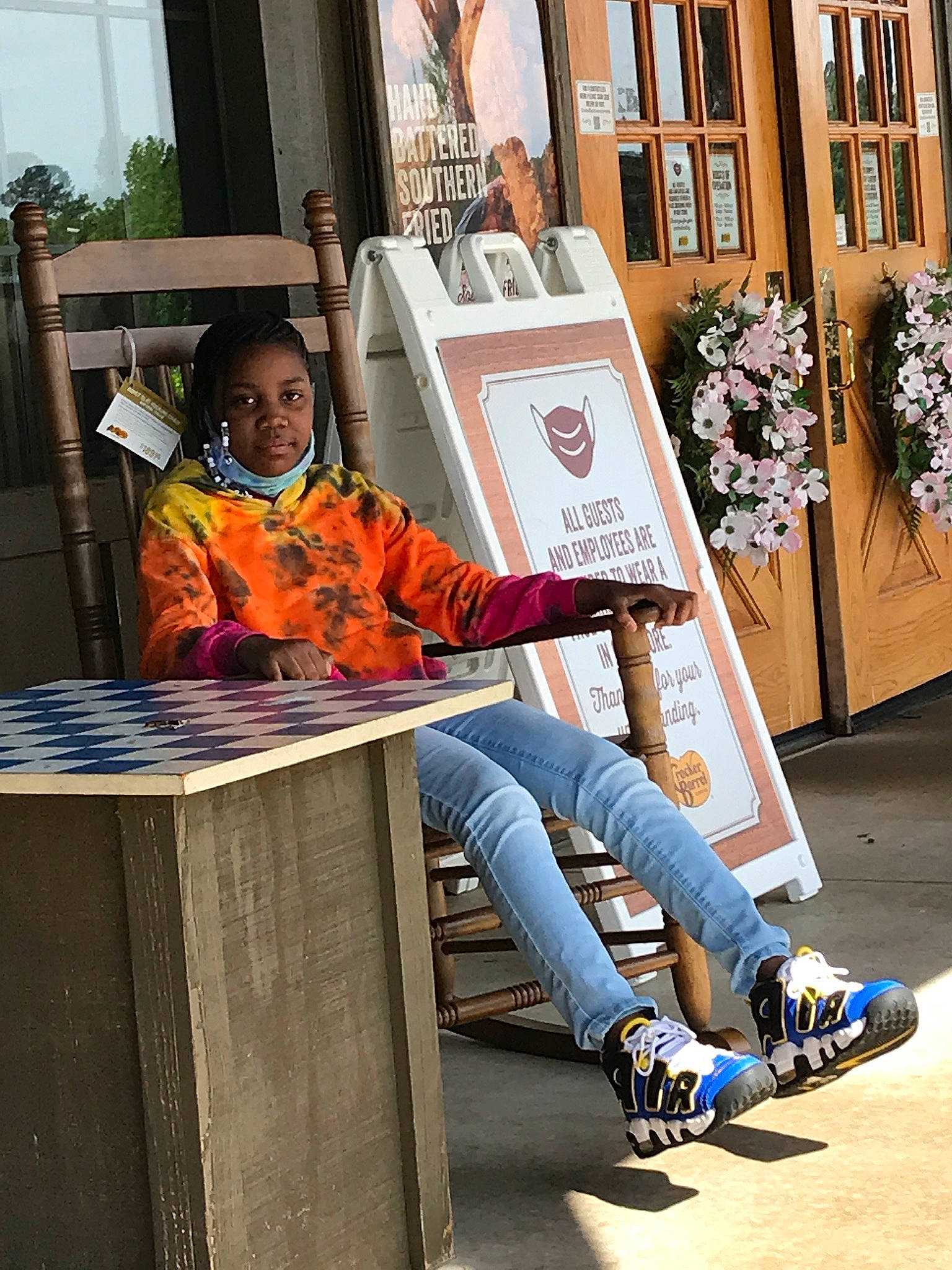 Jaida is registered to the contest to win money with this photo: boot, denim, eyewear, flooring, fun, human_leg, knee, leg, leisure, person, roller_skates, roller_skating, roller_sport, rolling, sitting, sneakers, sports_equipment, street, street_fashion, t_shirt