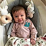 Nova joined the competition — help win amazing prizes! baby, infant, smiling, pink_onesie, blanket, floral_pattern, bunny_toy, plush_toy, baby_seat, cozy, cute, child, face, hand, soft_toys, indoors, portrait, happy, lying_down, comfort