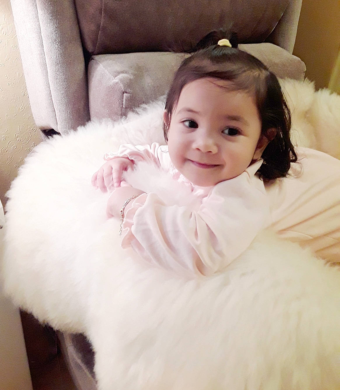 Summer is registered to the contest to win money with this photo: baby, baby_toddler_clothing, bridal_accessory, bridal_clothing, comfort, couch, dress, eye, flash_photography, gown, hair, happy, headpiece, iris, joy, long_hair, person, pink, sleeve, smile