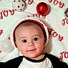 Emmett joined the competition — help win amazing prizes! baby, infant, face, hat, christmas, holiday, ornaments, red, white, blanket, smile, cute, child, festive, portrait, indoors, closeup, happy, apparel, headwear