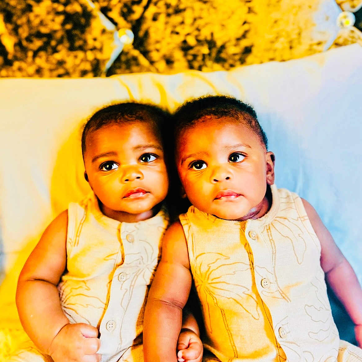 Alph Twins joined the competition — help win amazing prizes! adorable, babies, baby, bed, child, cute, expression, headboard, holding_hands, indoor, infant, matching_clothes, people, pillow, portrait, sitting, skin, twin_babies, yellow_outfit, young_child