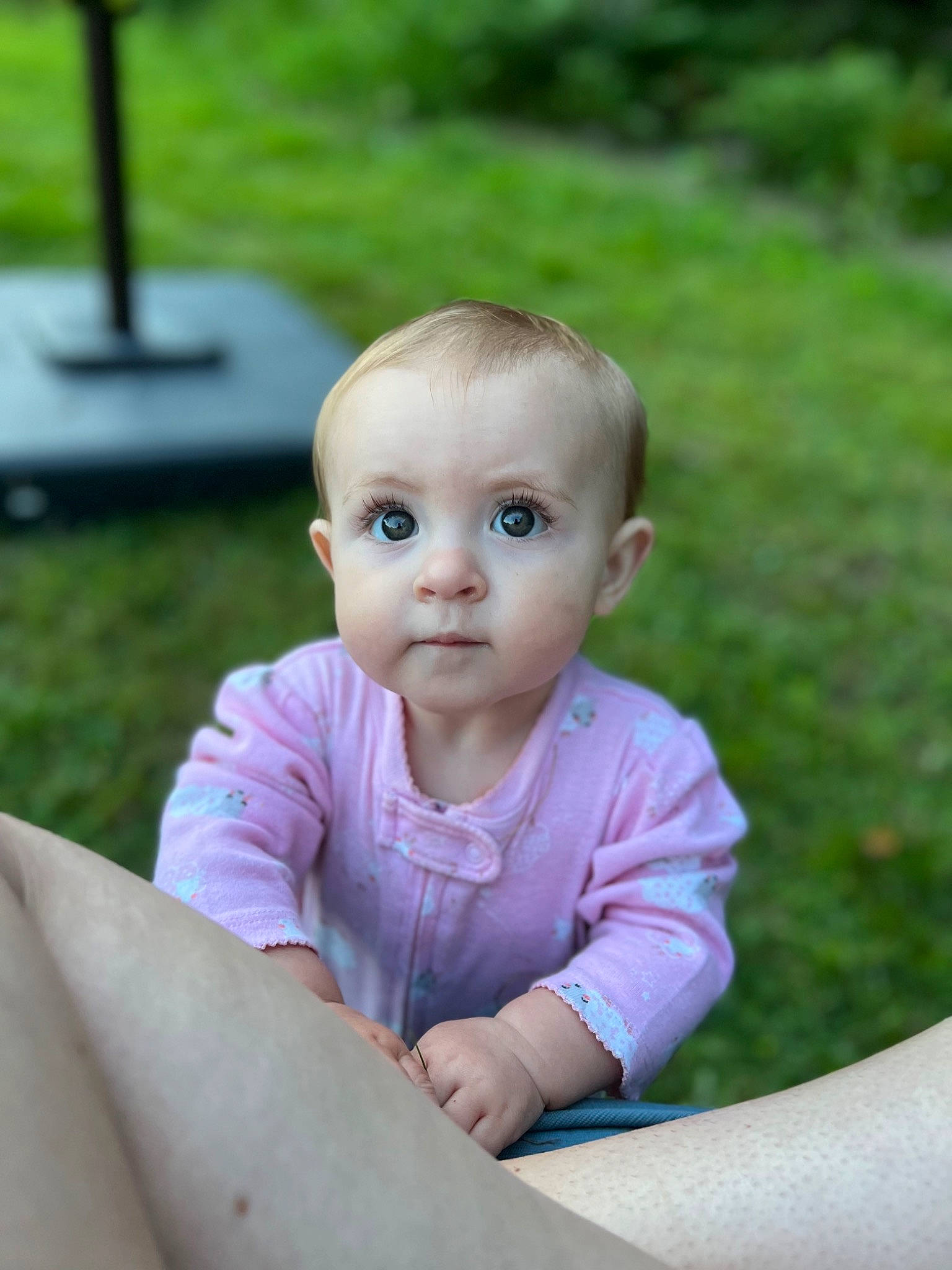 Adriana is registered to the contest to win money with this photo: baby, baby_toddler_clothing, cheek, eye, face, fun, grass, happy, head, leisure, lip, people_in_nature, person, plant, recreation, skin, sleeve, smile, summer, toddler