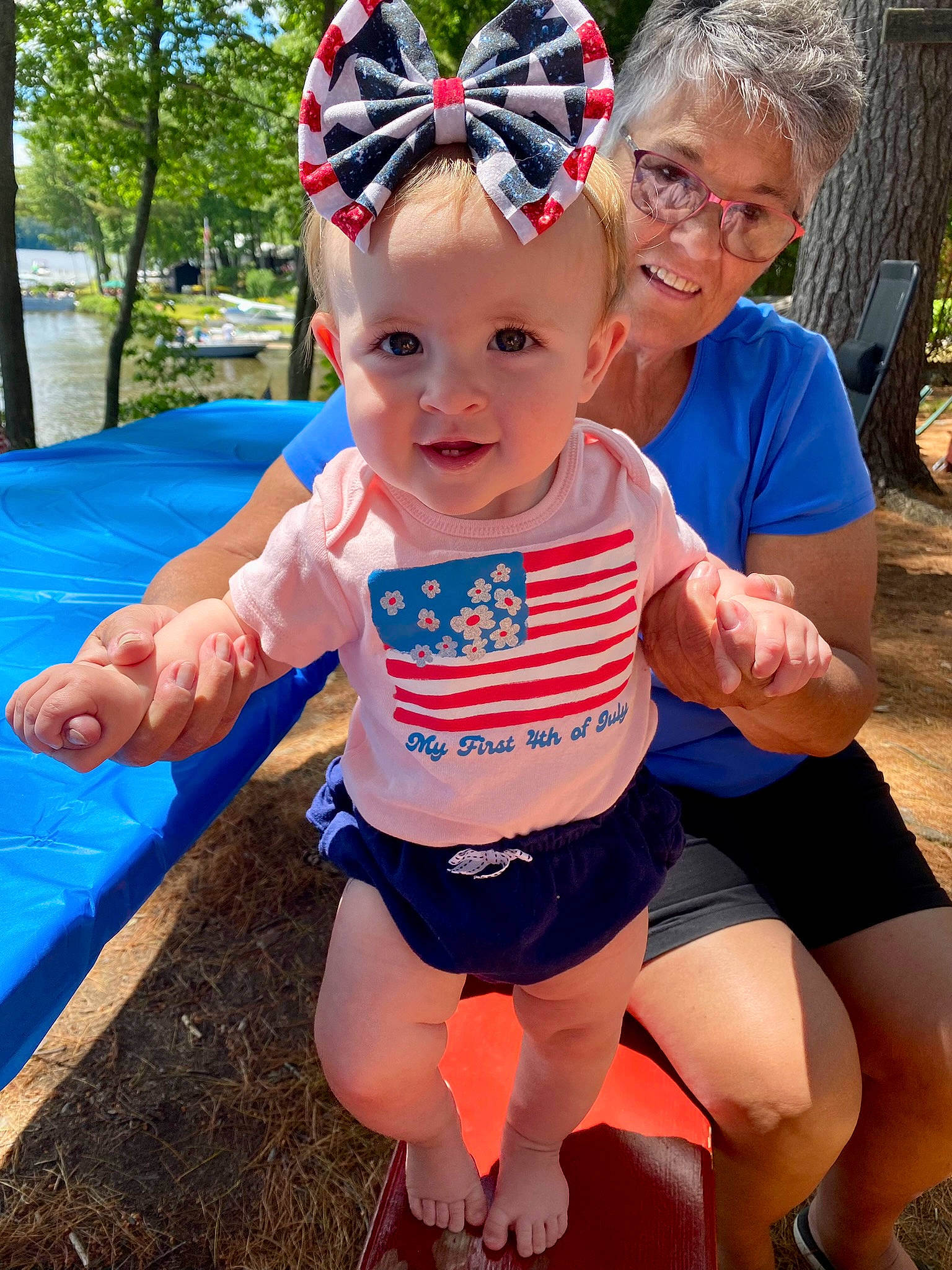 Adriana joined the competition — help win amazing prizes! baby_toddler_clothing, blue, eye, eyewear, face, fun, glasses, grass, happy, head, headwear, leisure, organ, people, person, photograph, pink, plant, skin, smile