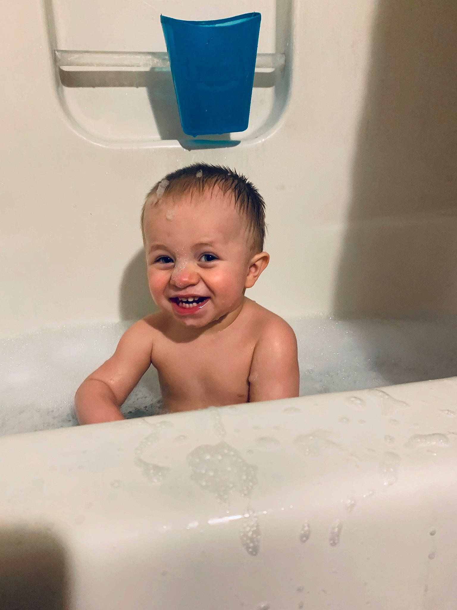 Jaxton joined the competition — help win amazing prizes! baby, baby_bathing, bathing, bathroom, bathtub, blue, child, composite_material, fluid, fun, happy, joy, liquid, person, plumbing, plumbing_fixture, room, skin, smile, tap