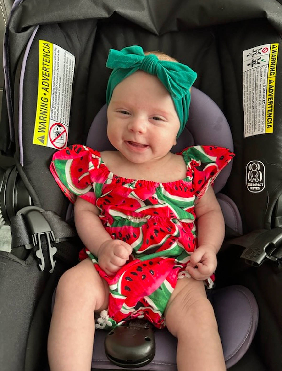 Everly joined the competition — help win amazing prizes! auto_part, baby, baby_carriage, baby_products, baby_toddler_clothing, car_seat, chair, child, comfort, costume_hat, eye, fashion_accessory, fun, green, happy, headwear, joy, lap, person, sitting