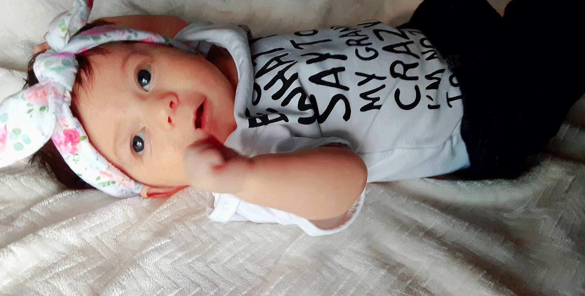 Isabella is registered to the contest to win money with this photo: baby, baby_toddler_clothing, cheek, child, comfort, headwear, human, linens, lip, nose, person, skin, toddler