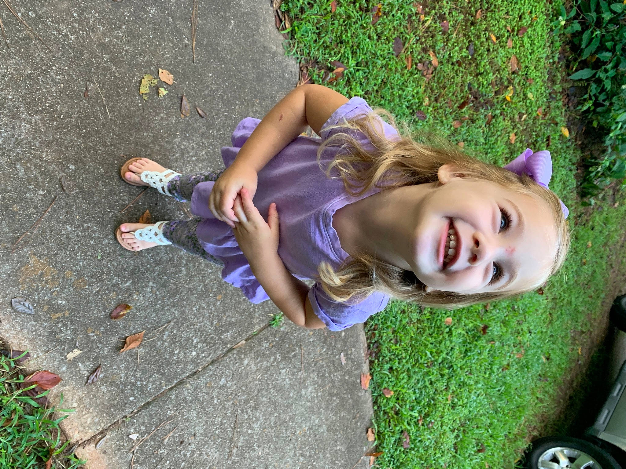 Ella is registered to the contest to win money with this photo: asphalt, child, city, electric_blue, fun, grass, grass_family, happy, human_leg, joint, joy, leaf, leisure, people_in_nature, person, plant, public_space, recreation, road_surface, smile