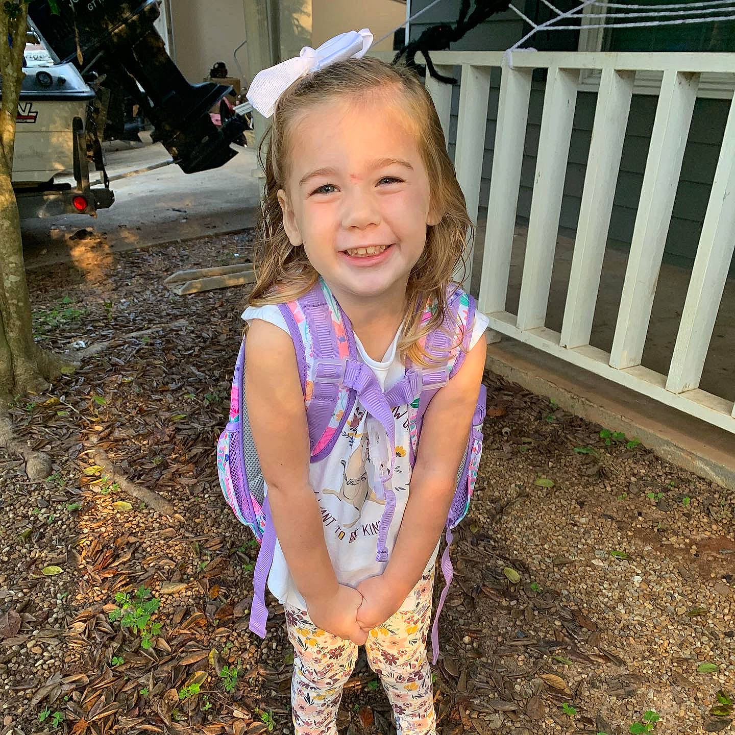 Ella joined the competition — help win amazing prizes! electric_blue, eye, face, fawn, grass, hair, happy, iris, joy, leg, leisure, long_hair, mammal, motorcycle, people_in_nature, person, recreation, smile, standing, toddler