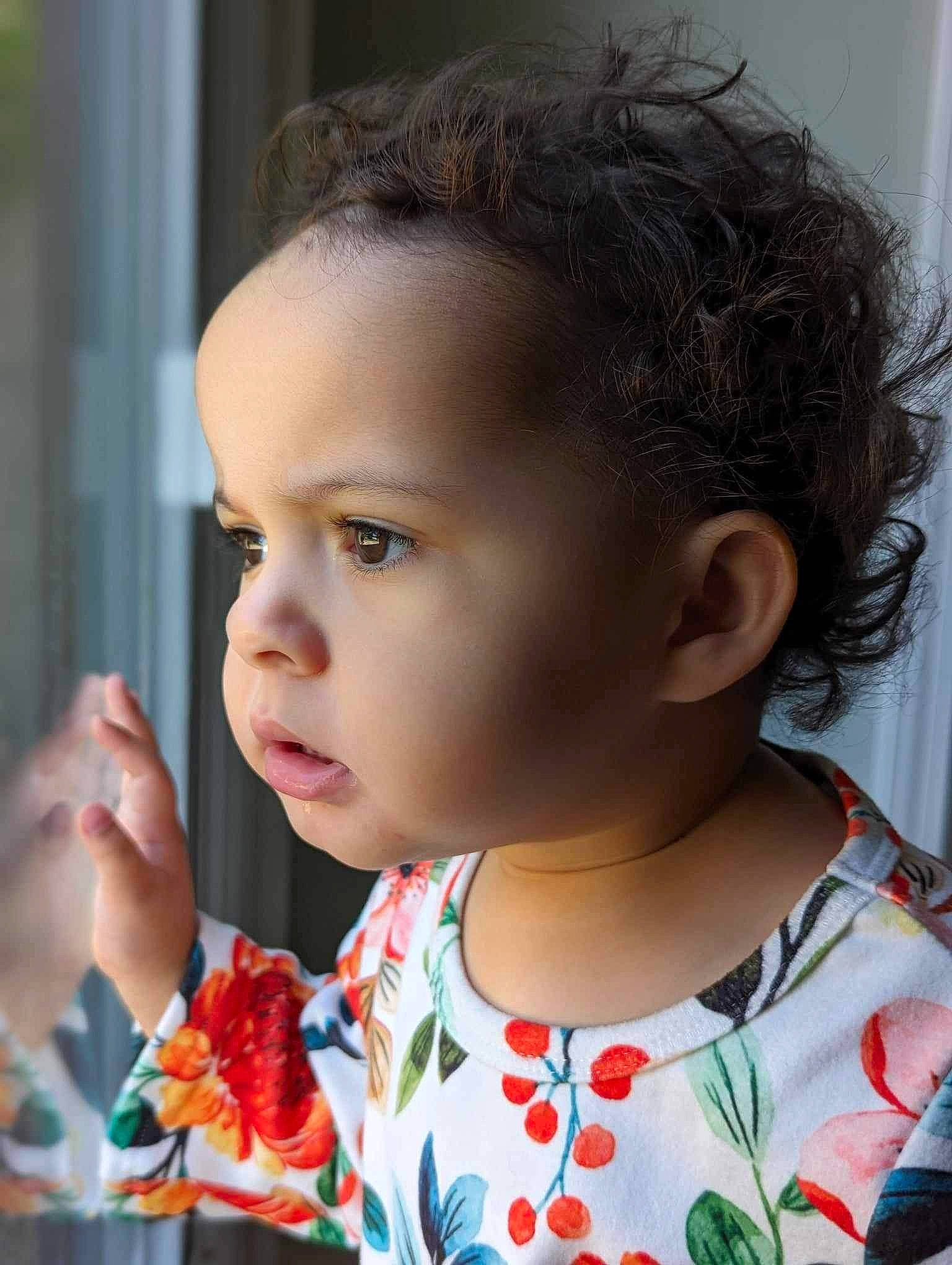 Charli is registered to the contest to win money with this photo: baby, baby_toddler_clothing, cheek, child, dress, eyelash, facial_expression, fruit, happy, lip, neck, nose, person, petal, plant, portrait_photography, skin, sweetness, toddler, tradition