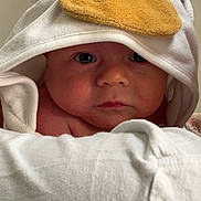Easton joined the competition — help win amazing prizes! baby, child, towel, hood, duck, face, skin, cute, eyes, infant, portrait, indoor, clothing, soft, warm, expression, head, closeup, newborn, resting