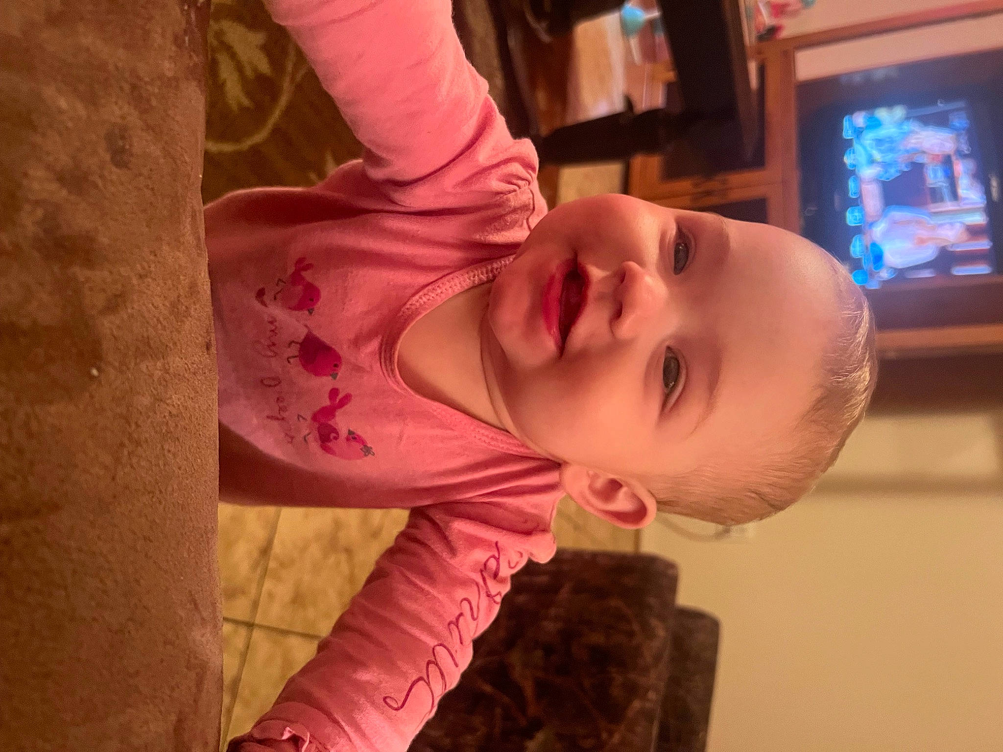 Kimber is registered to the contest to win money with this photo: baby, baby_toddler_clothing, cheek, chin, glasses, hair, happy, head, human, human_body, leg, lip, mouth, nose, people, person, skin, sleeve, smile, television