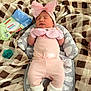 Heyzel is registered to the contest to win money with this photo: baby, newborn, pink_clothing, headband, mittens, socks, bow, blanket, pacifier, baby_wipes, cushion, sleeping, infant, soft_toys, bed, resting, indoor, cute, cozy, child