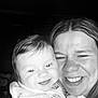 Romy a rejoint le concours — aidez-le/la à gagner de superbes lots ! adult, baby, black_and_white, candid, closeup, expression, face, family, hair, happy, holding, indoors, infant, joy, love, person, portrait, skin, smile, warmth