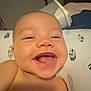 Maverick joined the competition — help win amazing prizes! baby, background, bed, blanket, cheerful, child, closeup, container, expression, face, happy, head, indoor, leaf_pattern, mouth_open, person, pillow, skin, smiling, tongue