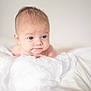 baby, infant, blue_eyes, blanket, soft, white, cute, portrait, child, skin, head, expression, lying_down, newborn, indoors, young, person, closeup, face, peaceful