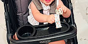 Blakelynn Grace is registered to the contest to win money with this photo: baby, stroller, pacifier, pink_bow, pink_sneakers, graco, happy, smiling, child, indoor, floor, toy, footwear, seatbelt, person, cute, infant, clothing, accessory, portrait