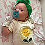 Irelynn joined the competition — help win amazing prizes! baby, infant, pacifier, headband, green_bow, mittens, flower_patch, white_outfit, blanket, pink_pattern, lying_down, cute, soft_light, portrait, child, newborn, sleepwear, cozy, indoor, adorable