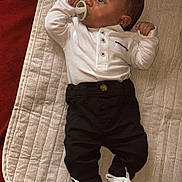 Ayden participe au concours pour gagner de l'argent avec cette photo : baby, baby_shoes, black_pants, blanket, changing_pad, clothing, cute, eyes, face, hands, indoor, infant, lying_down, newborn, pacifier, portrait, relaxing, skin, small_shoes, white_shirt