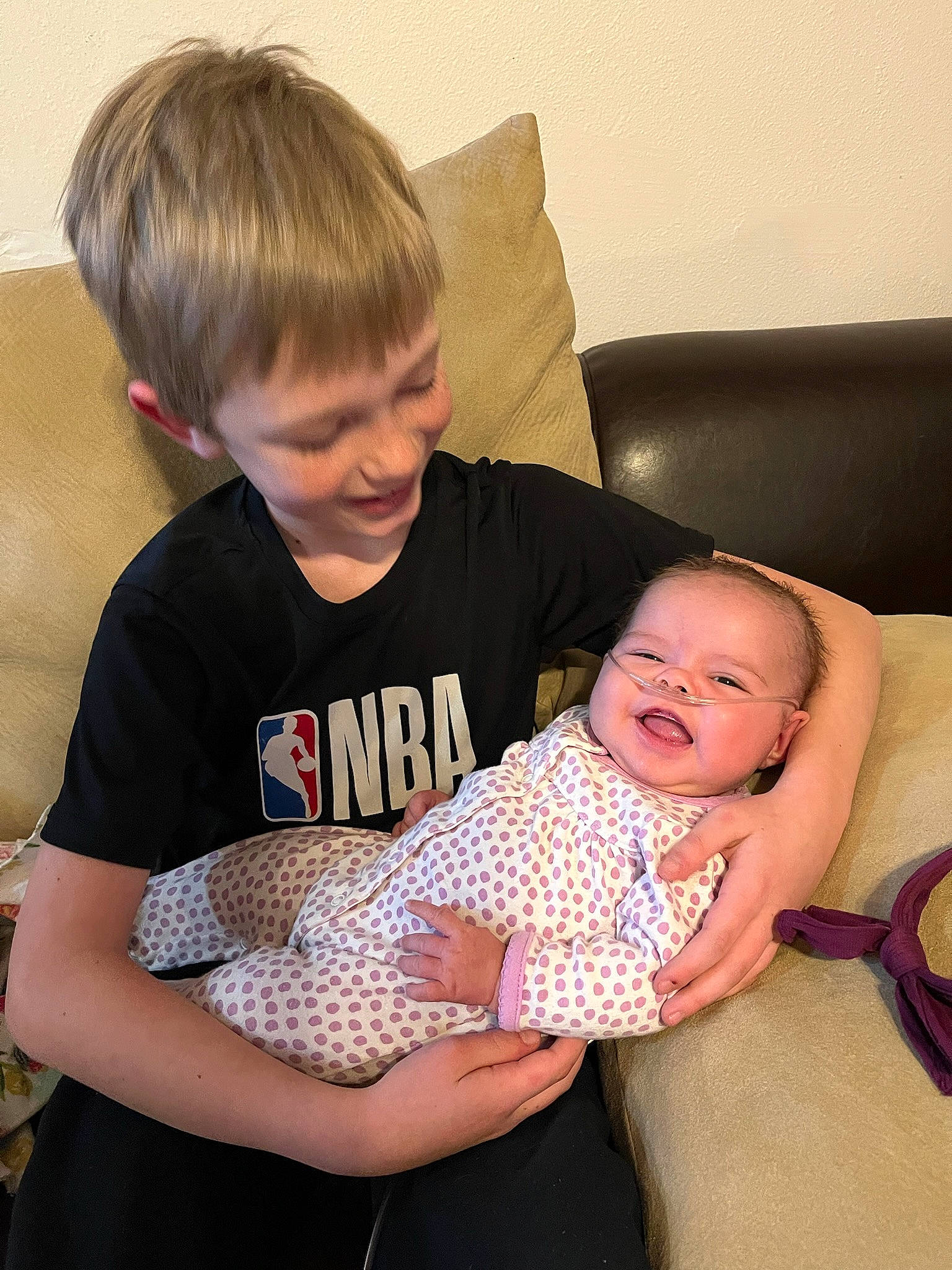 Lillian joined the competition — help win amazing prizes! arm, baby, baby_toddler_clothing, child, comfort, couch, eye, facial_expression, finger, fun, happy, joy, lap, mammal, organ, people, person, sitting, sleeve, smile