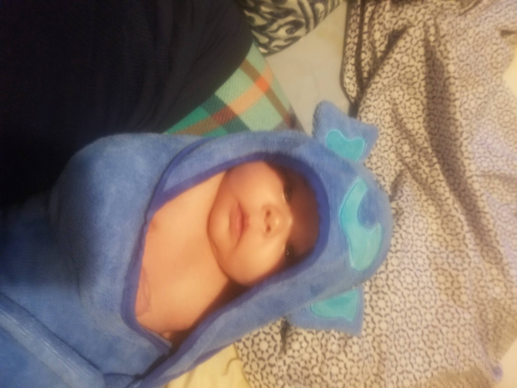 Lillian is registered to the contest to win money with this photo: baby, baby_products, baby_safety, baby_sleeping, baby_toddler_clothing, beanie, bedtime, blanket, cheek, comfort, electric_blue, hat, headwear, iris, linens, nap, pattern, person, room, sleep