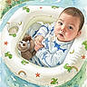 Armando is registered to the contest to win money with this photo: art, baby, blue_clothing, child, cute, floatation_ring, frogs, greenery, illustration, infant, plush_toy, portrait, rainbows, sitting, sloth, stars, toy, water, watercolor, young_child