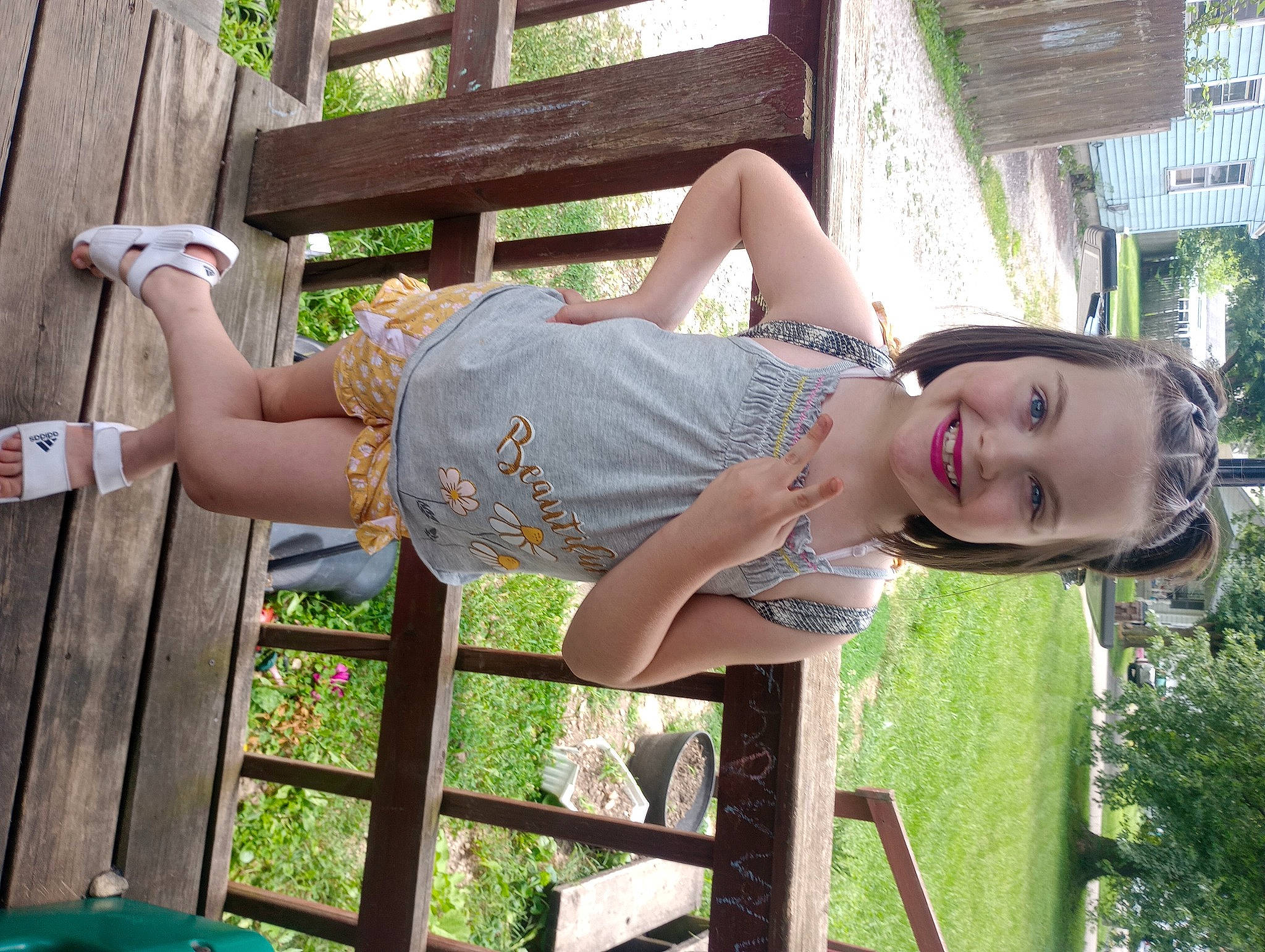 Arabella is registered to the contest to win money with this photo: botany, fashion, fun, grass, happy, human_leg, joint, joy, knee, leg, leisure, people_in_nature, person, plant, sandal, smile, spring, summer, thigh, tree