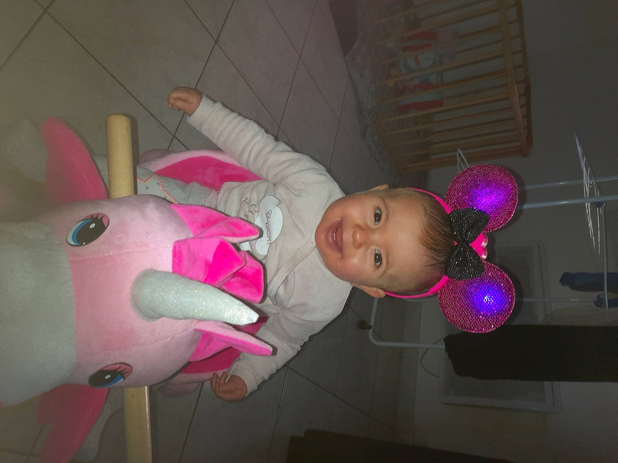 Mila participe au concours pour gagner de l'argent avec cette photo : baby, baby_toddler_clothing, baby_toys, carmine, child, costume, event, fun, happy, joy, magenta, party_supply, person, pink, plush, room, smile, stuffed_toy, toddler, toy