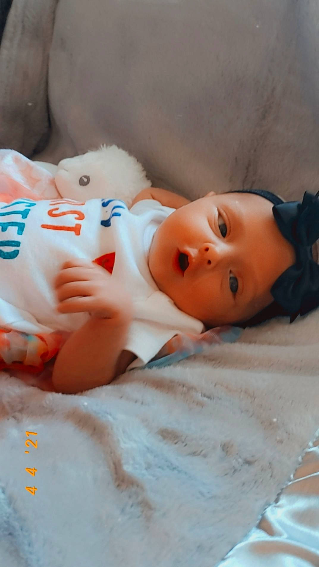 Waverly joined the competition — help win amazing prizes! baby, baby_sleeping, bed, cheek, child, comfort, doll, eye, eyelash, headgear, headwear, human_body, joint, linens, mouth, nose, orange, person, skin, textile