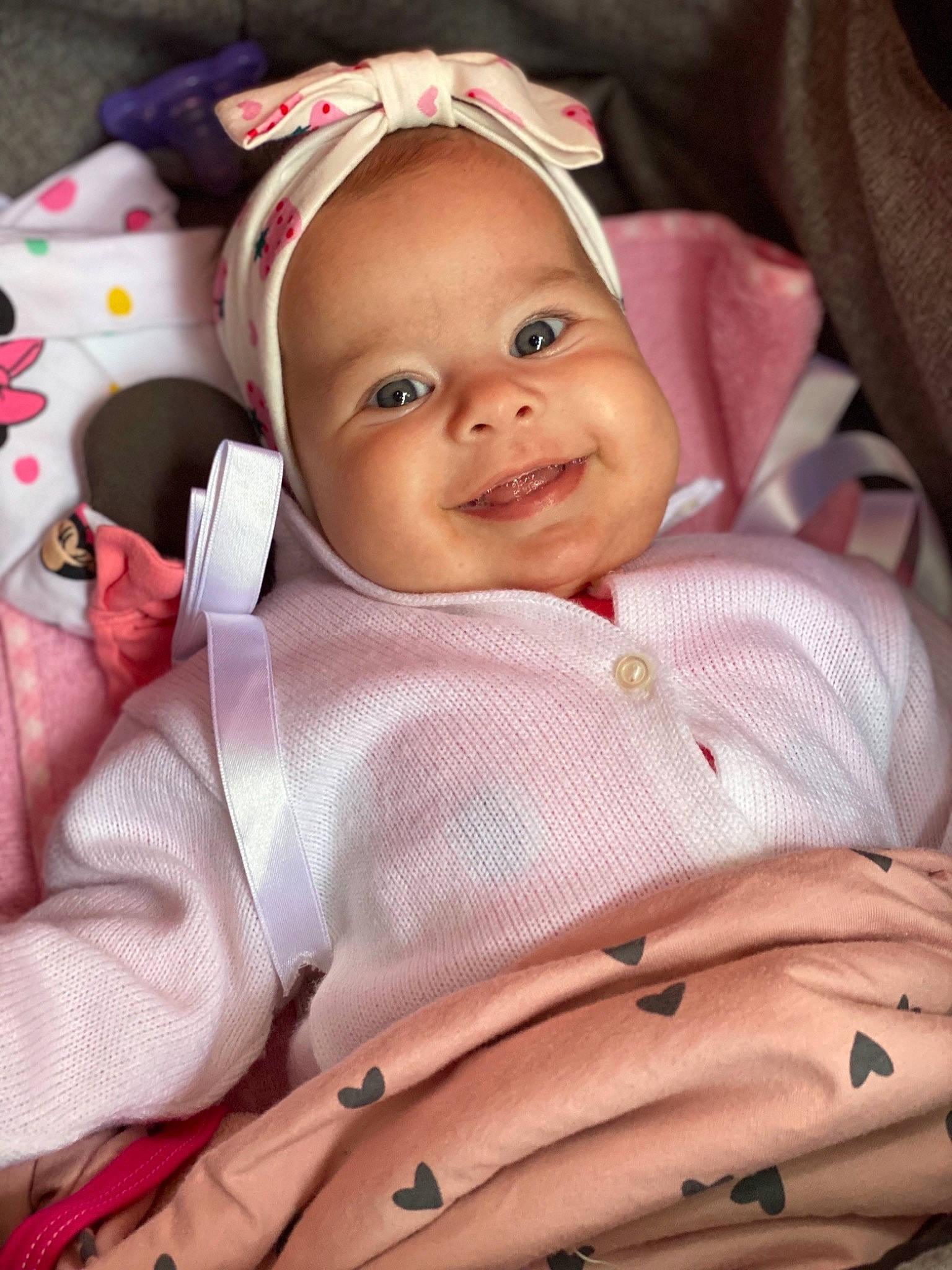 Lorena participe au concours pour gagner de l'argent avec cette photo : baby, baby_carriage, baby_products, baby_toddler_clothing, cheek, comfort, face, finger, happy, headwear, iris, joy, linens, lip, magenta, mouth, person, pink, skin, sleeve