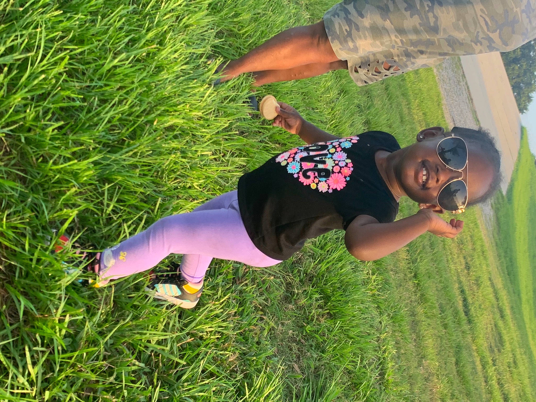 Briell joined the competition — help win amazing prizes! arm, black_hair, cool, flower, fun, grass, grass_family, grassland, green, hand, happy, lawn, leisure, meadow, people_in_nature, person, photography, plant, smile, summer