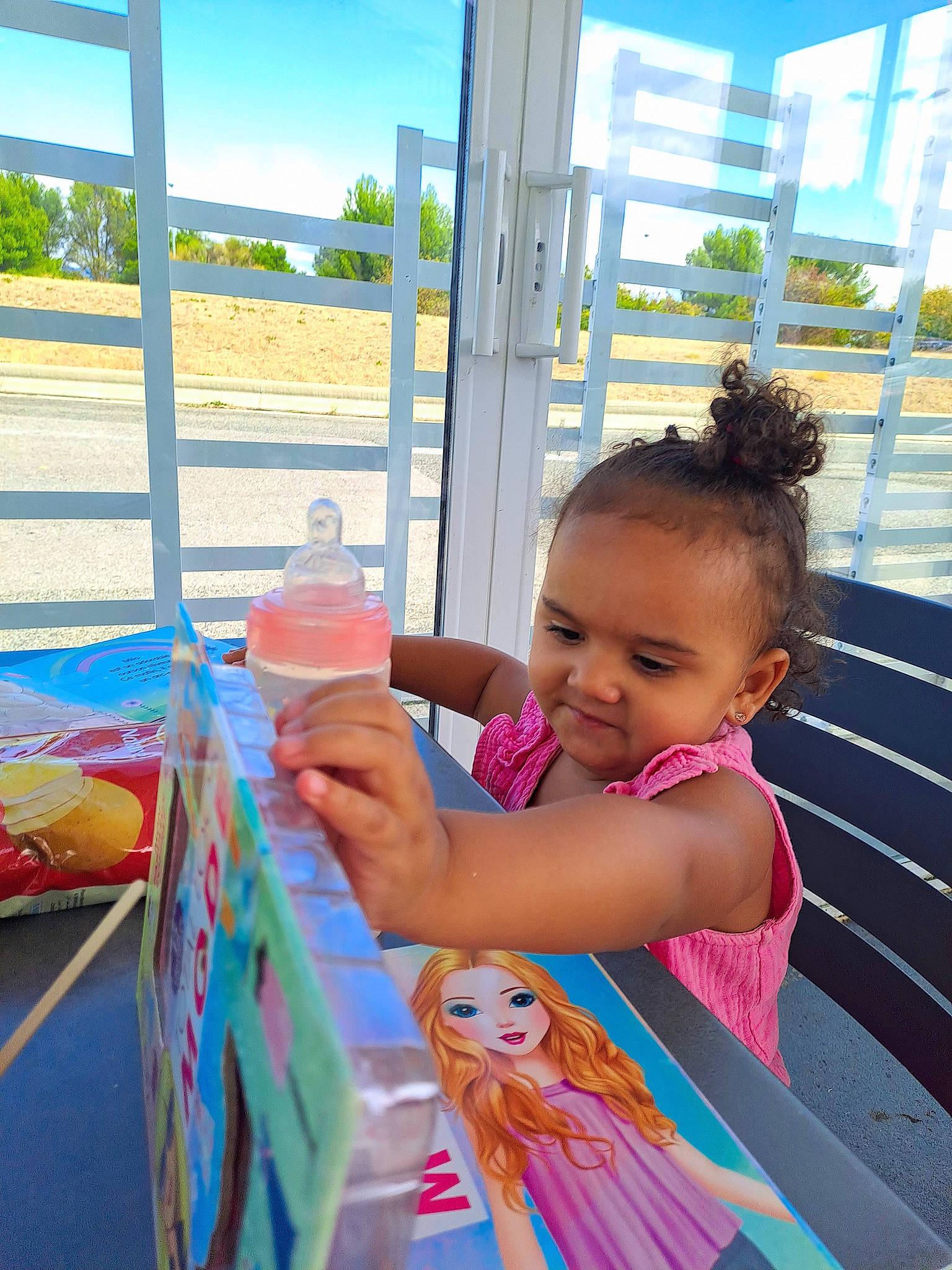 Linayah participe au concours pour gagner de l'argent avec cette photo : child, fun, happy, leisure, magenta, person, pink, play, recreation, sitting, sky, summer, toddler, travel, tree, vacation, water