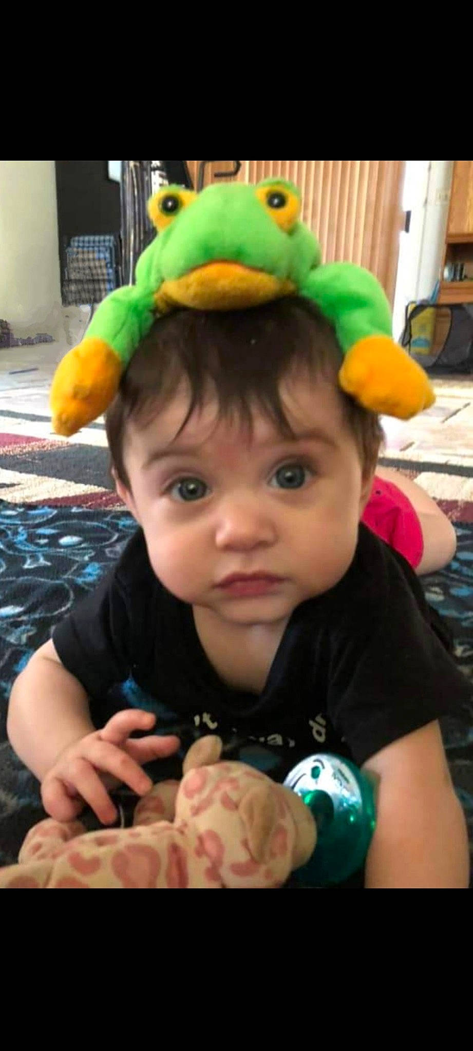 Aaliyah is registered to the contest to win money with this photo: baby, baby_toddler_clothing, cap, chair, cheek, child, event, eye, facial_expression, fashion_accessory, fun, green, happy, head, party_supply, person, pink, skin, snapshot, toddler