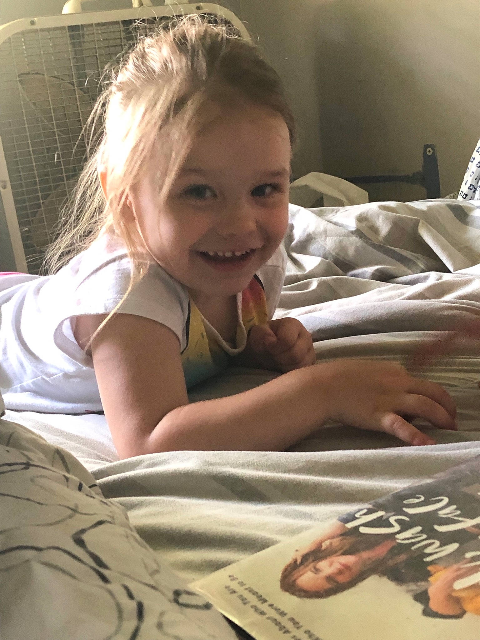 Skylynn is registered to the contest to win money with this photo: blond, child, homework, joy, learning, person, reading